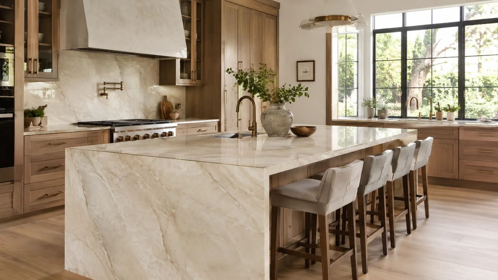 Warm beige quartzite kitchen countertops in a luxury kitchen with soft natural movement