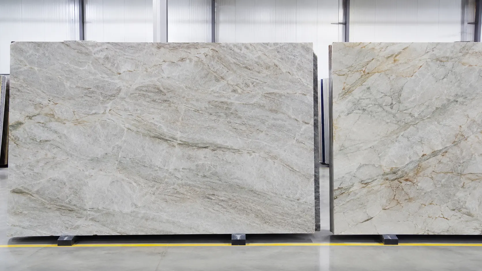 Full slab review of natural quartzite showing color variation and vein movement