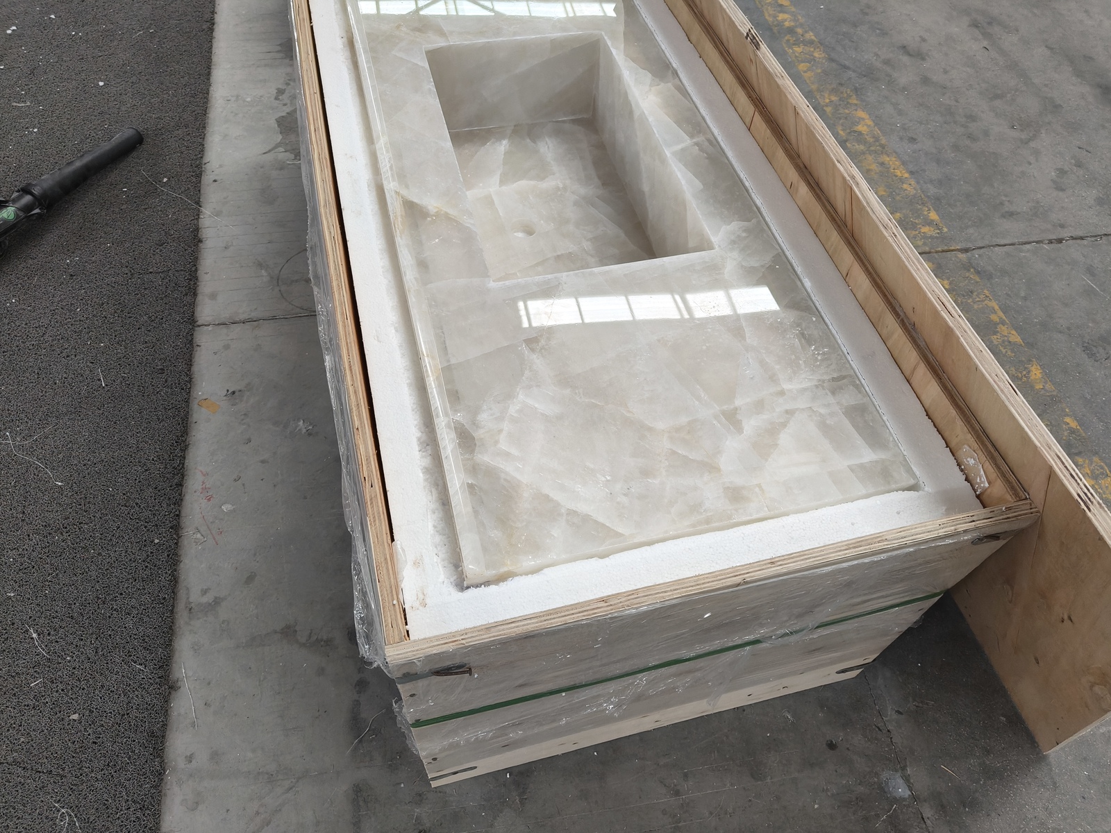 White Onyx Vanity Top Custom fabricated White Onyx vanity top showing translucent natural stone pattern